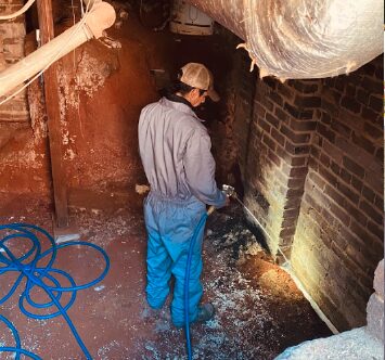 Liquid termite treatment applied in a crawl space
